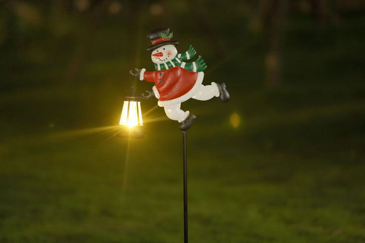Solar-powered decorative garden stake light with crescent moon fairy lantern