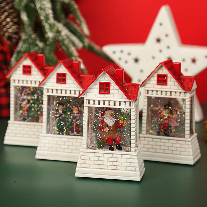 Illuminated Christmas village with moving figures