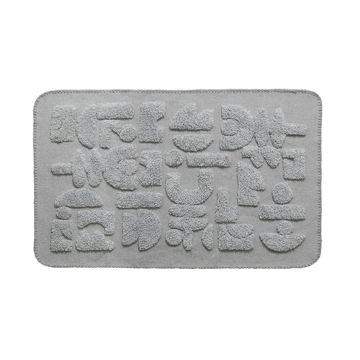 Luxurious organic cotton bath mat with relief pile structure