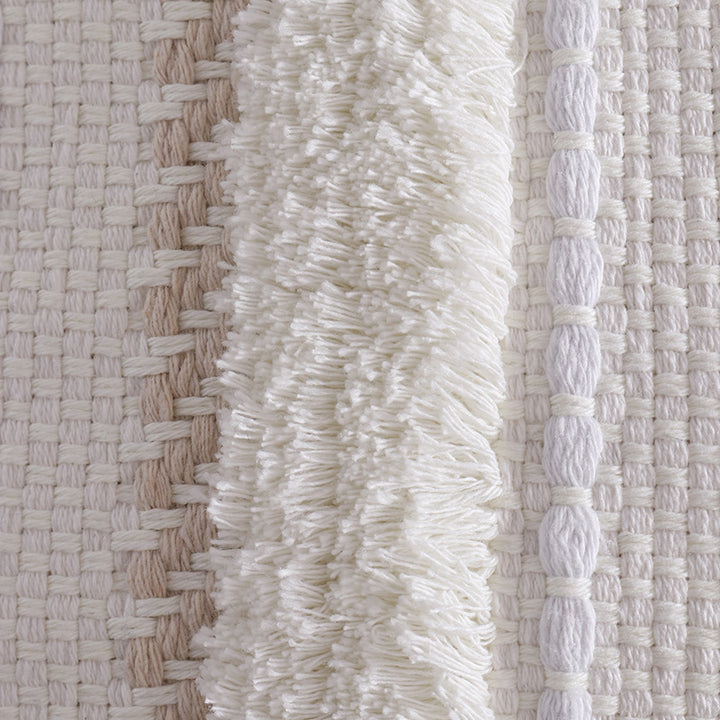 Structured living room carpet with 3D tufting and geometric diamond relief