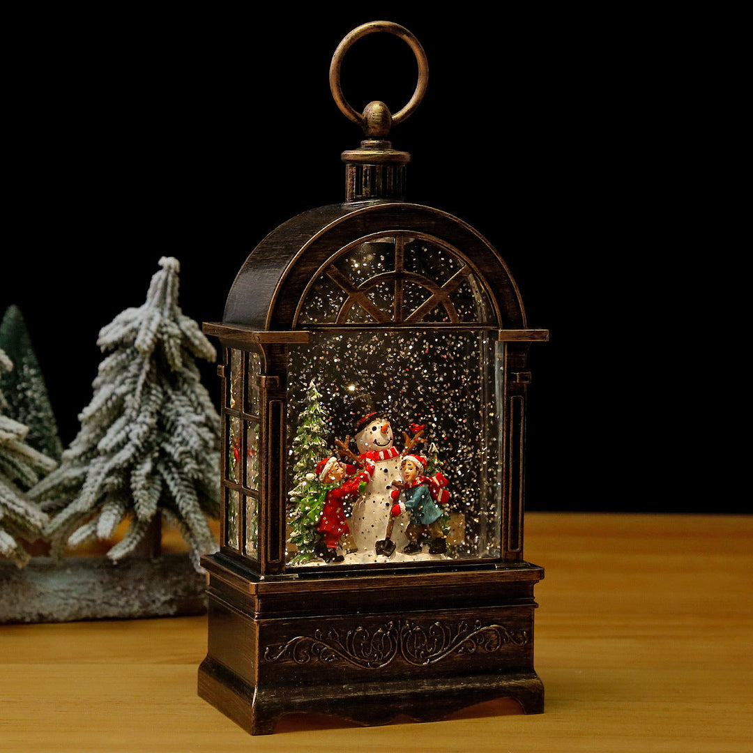 Nostalgic Christmas lantern with snowfall and moving Santa Claus scene