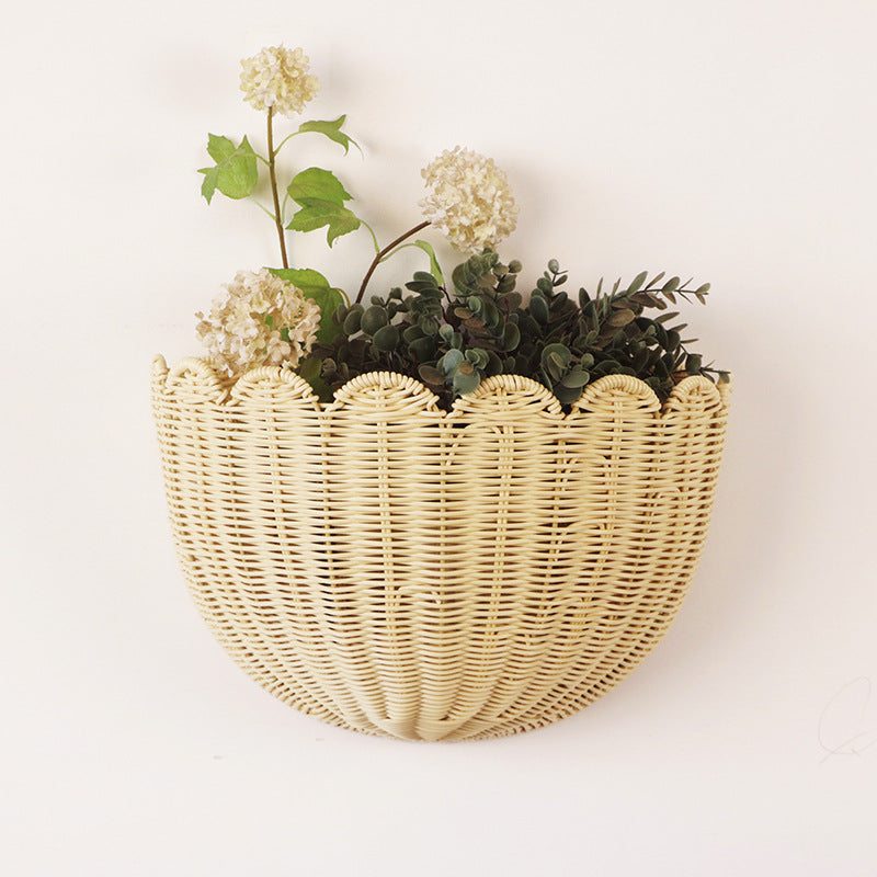 Decorative flower basket made of woven material