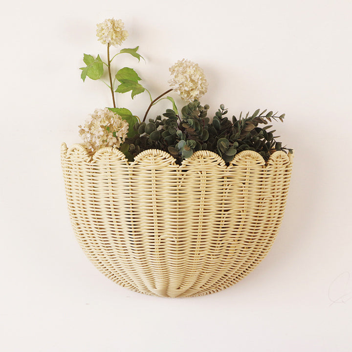 Decorative flower basket made of woven material