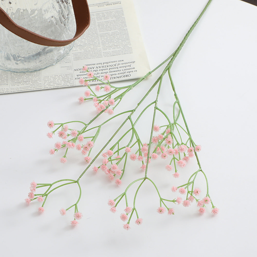 Decorative artificial flower branch with fine purple flowers