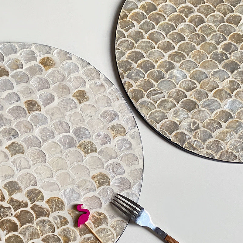 Round serving board made from noble shells