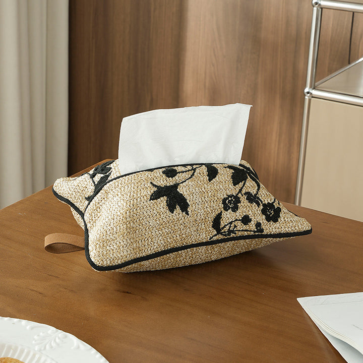 Woven tissue box cover in straw look with embroidered flower motif