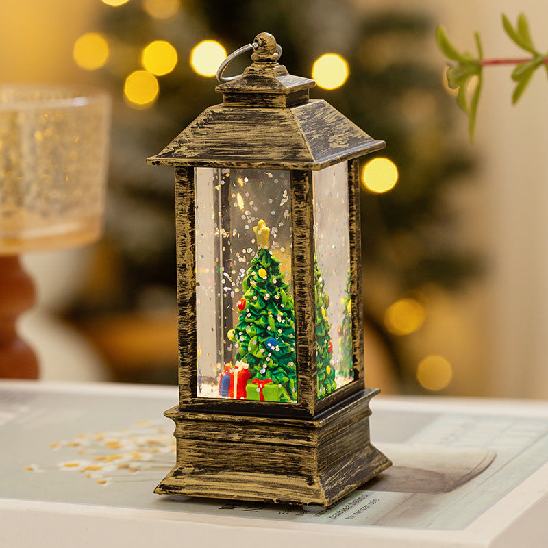 Christmas lantern with LED lighting and decorative snow effect