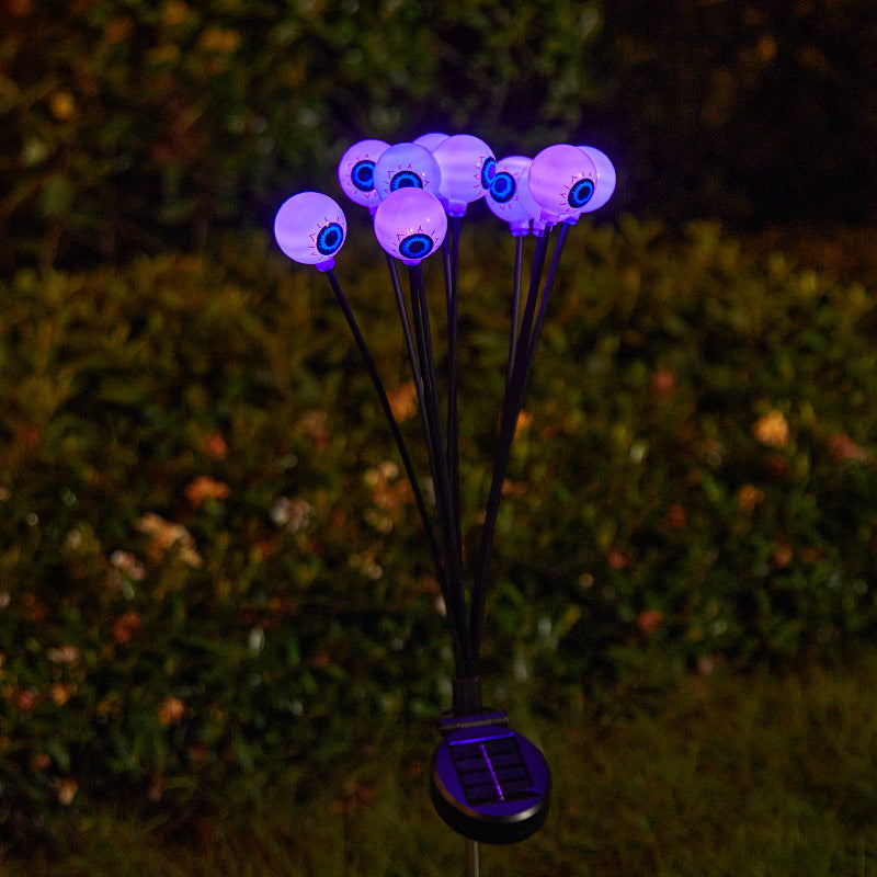 Creepy garden lights with eye motif