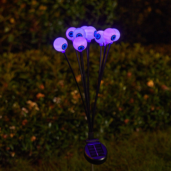 Creepy garden lights with eye motif