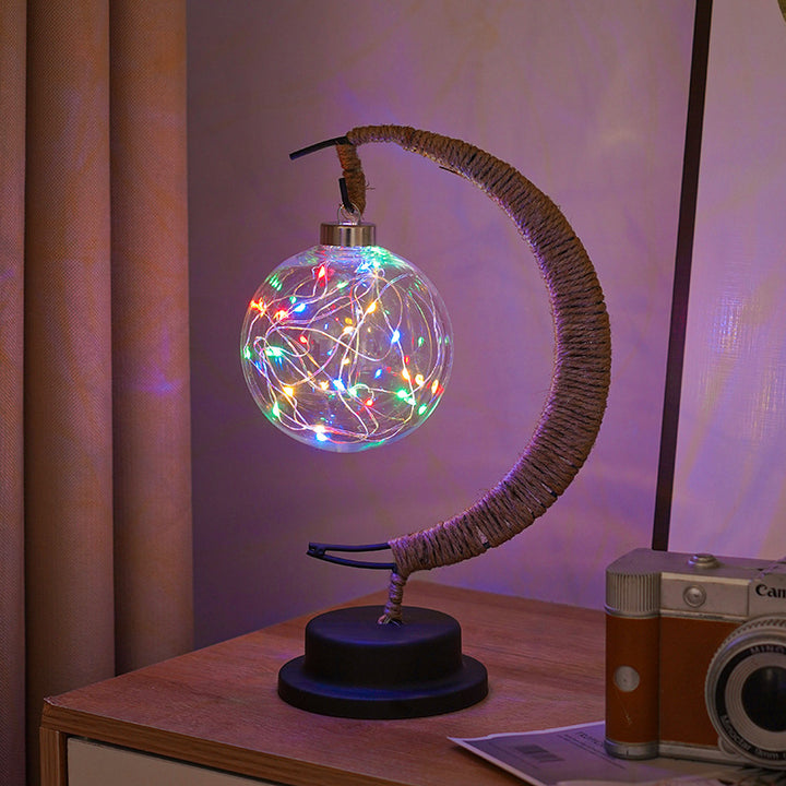 Decorative glass apple LED table lamp with moon-shaped rope-wrapped stand