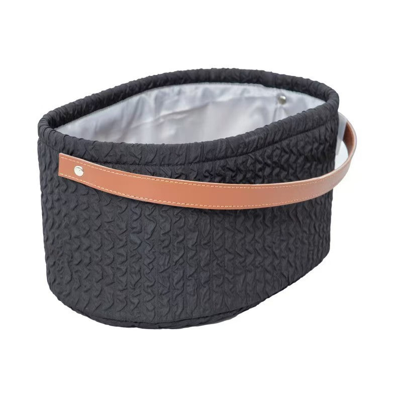 Elegant storage basket with faux leather handle