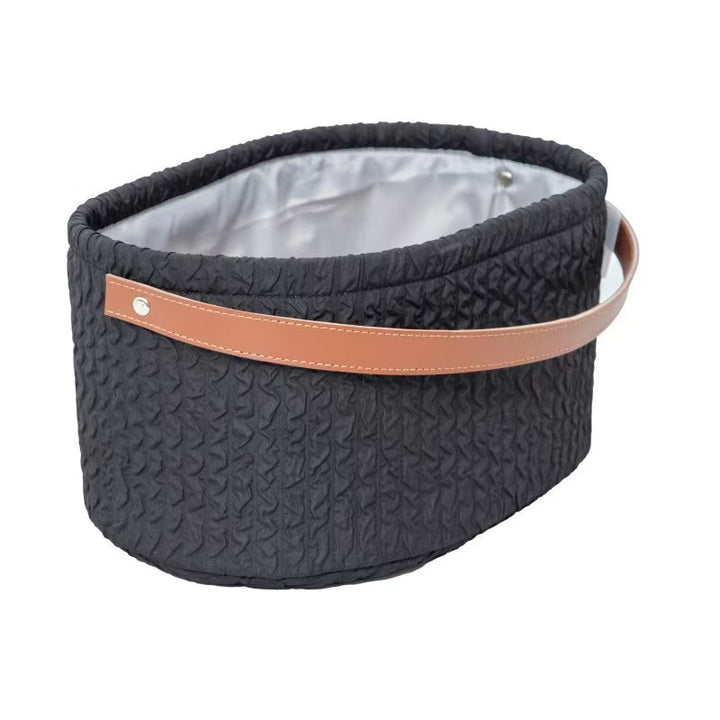 Elegant storage basket with faux leather handle