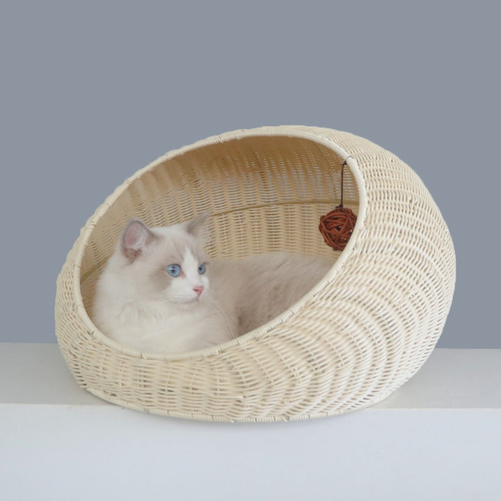 Cozy cat bed made of woven natural material