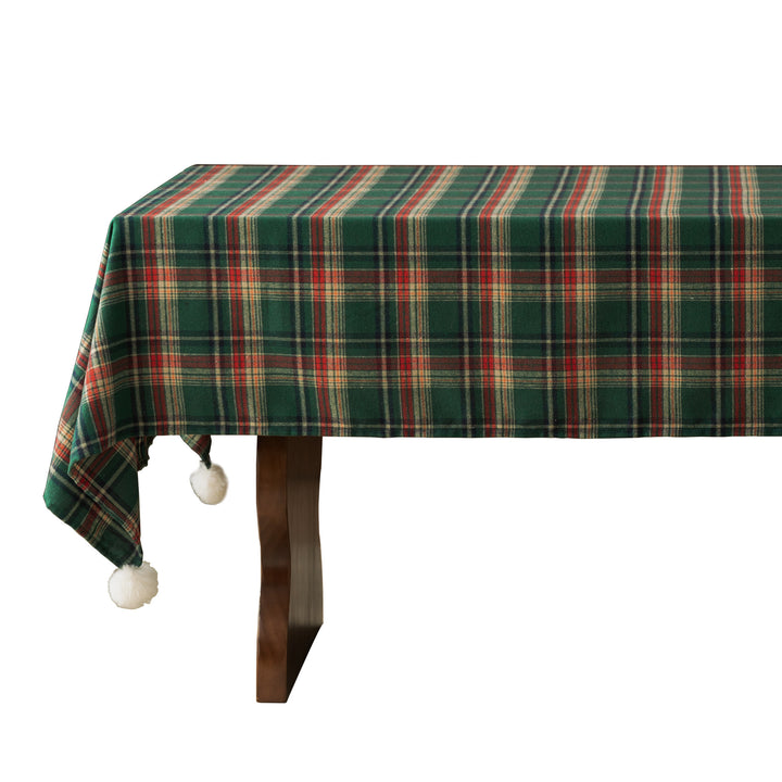 Rectangular checkered tablecloth made of cotton blend with pompom tassels
