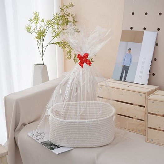 Natural storage basket with ribbons