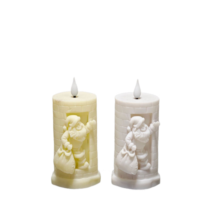 Christmas candle with Santa motif