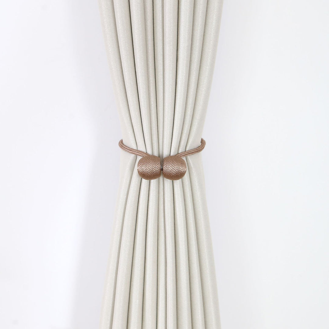 Decorative curtain tieback