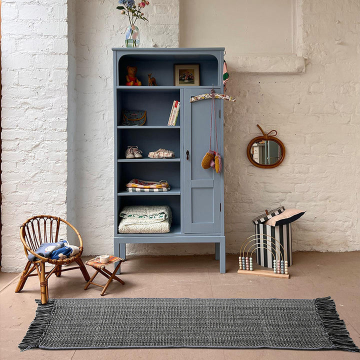 Woven table runner with dense herringbone jacquard and fringes