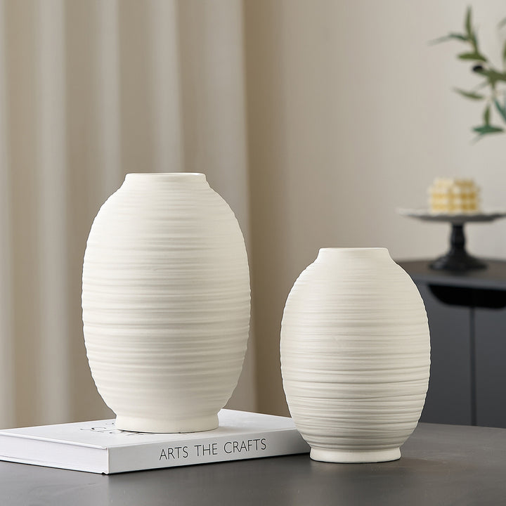 Decorative ceramic vase with artistic ribbed pattern