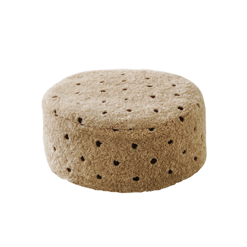 fluffy cylindrical winter hat made of teddy fleece with decorative hole pattern