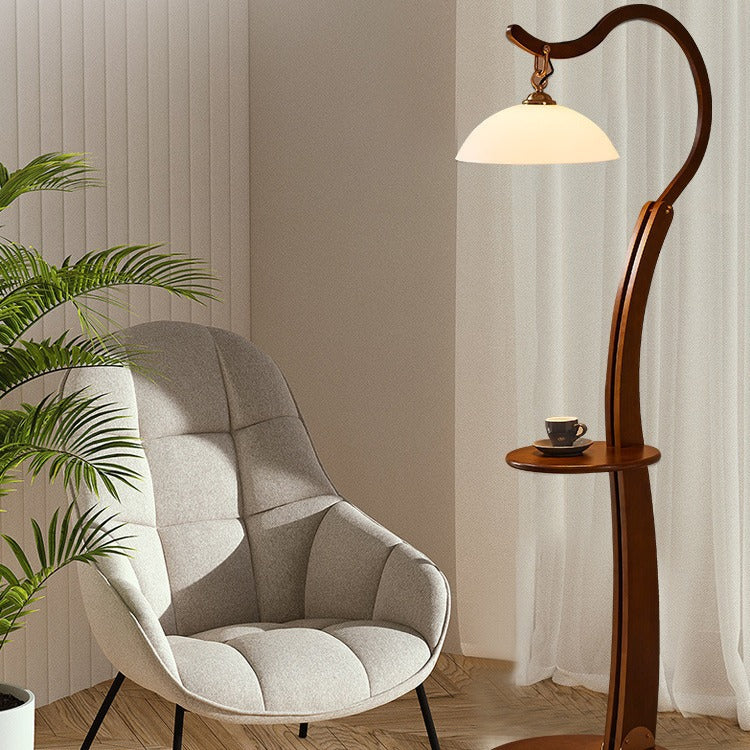 Artistic floor lamp with integrated side table