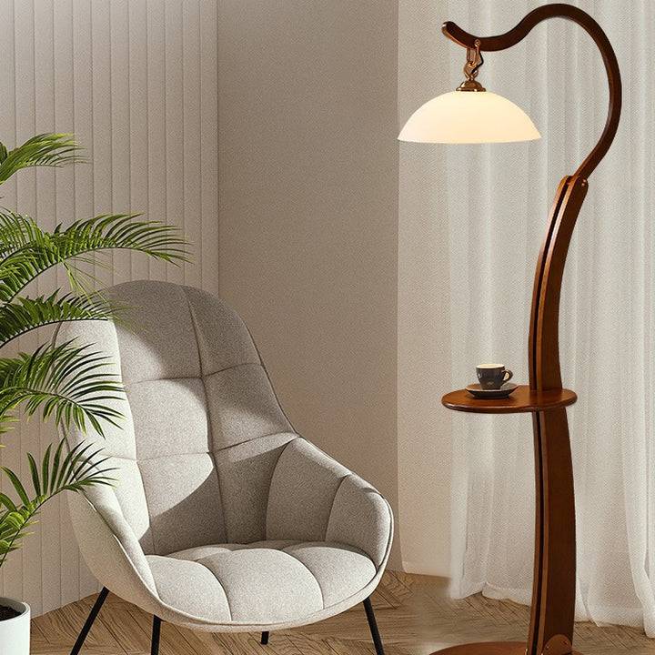 Artistic floor lamp with integrated side table
