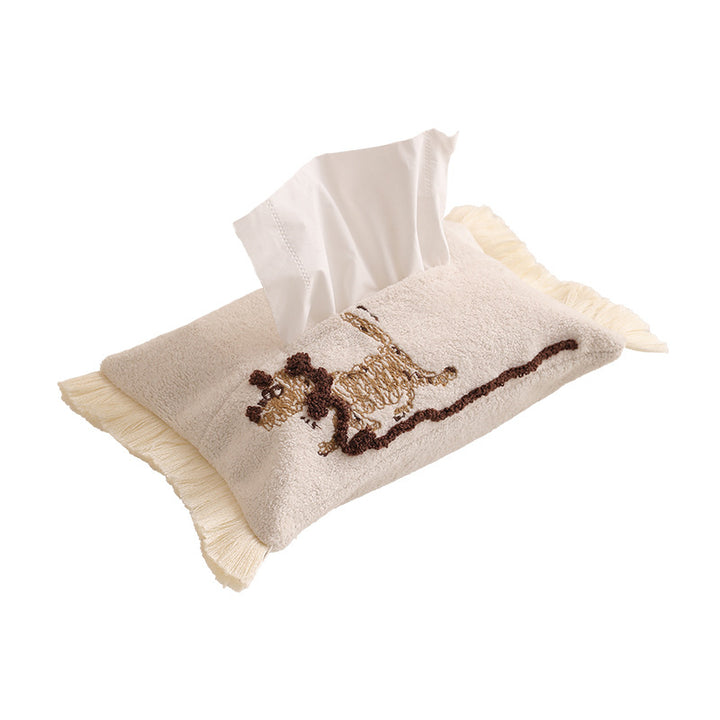 Plush tissue box cover with llama embroidery and decorative fringes