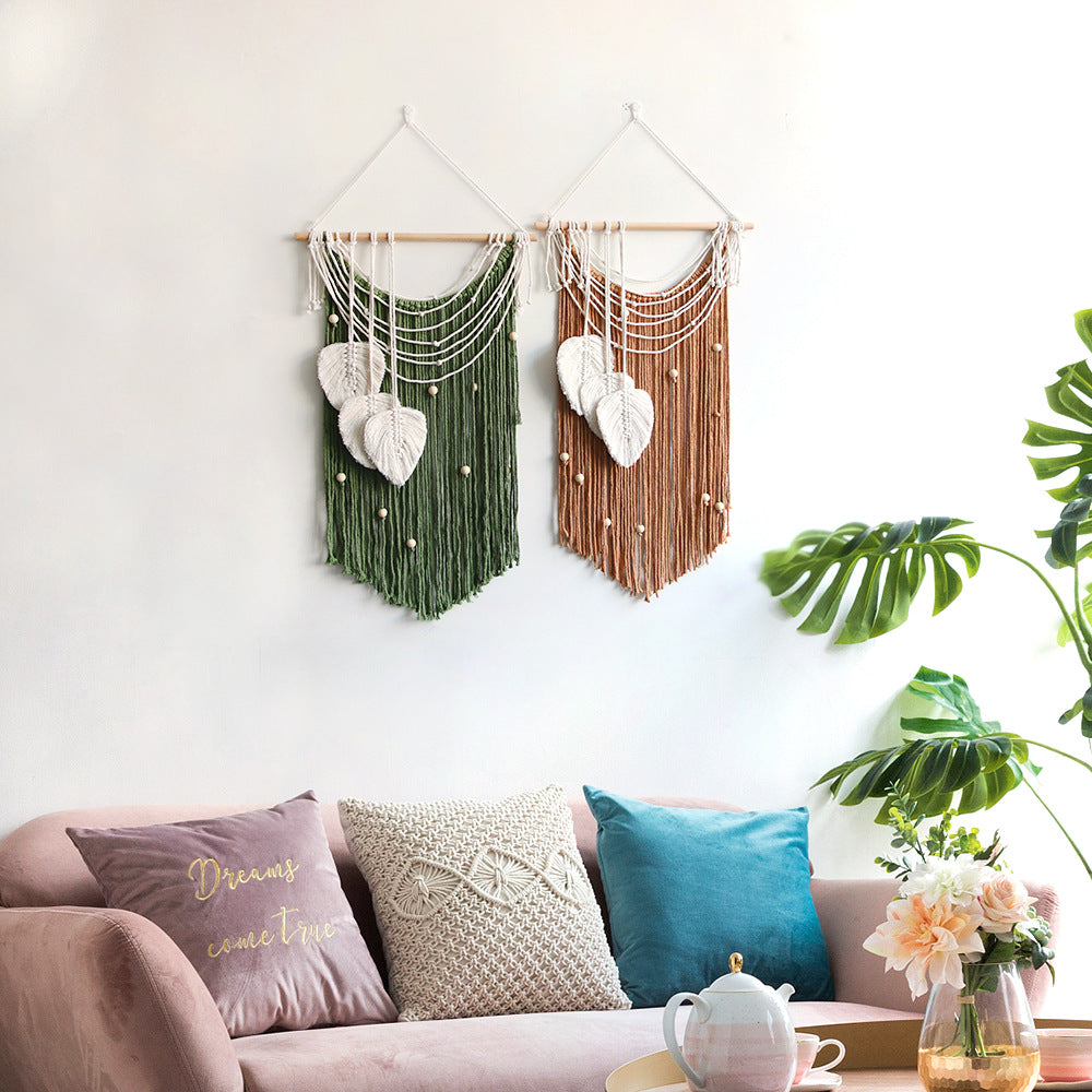 Artistic wall hanging made of macrame with hearts