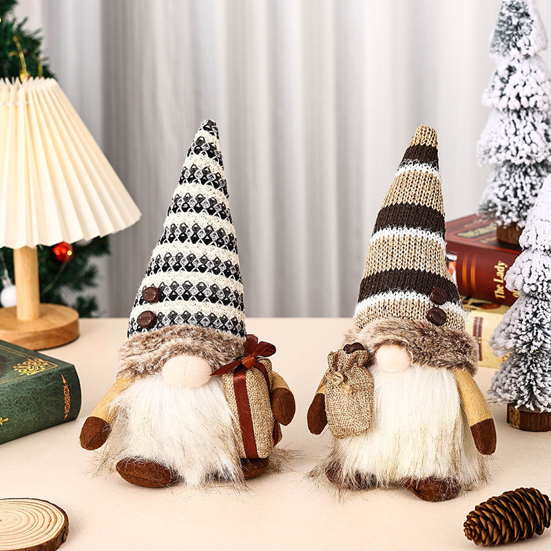 Decorative Christmas gnome with gift package
