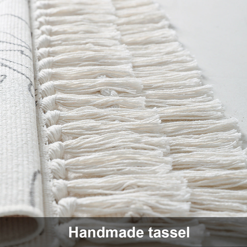 Decorative table runner made of cotton with botanical bird print and fringes