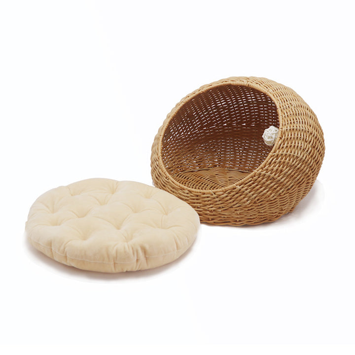 Cozy cat bed made of woven natural material