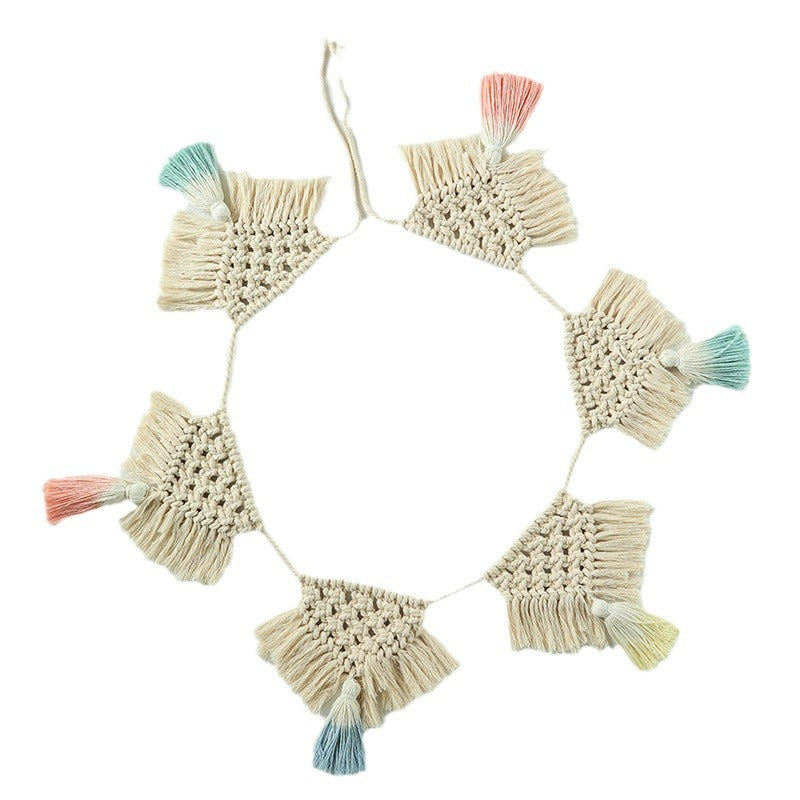 Macrame pennant string with hand-knotted triangle elements and tassels