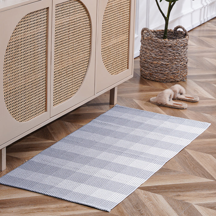 Flat-woven runner rug with check pattern and decorative border stripe