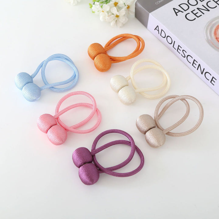 Decorative curtain tieback