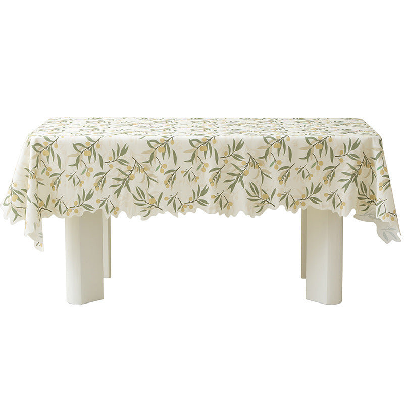 Round wipeable tablecloth with floral cut-out hem
