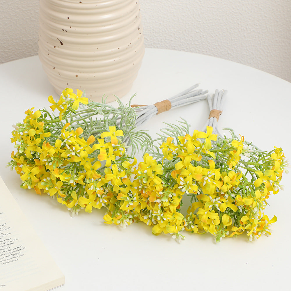 Decorative artificial flower arrangement
