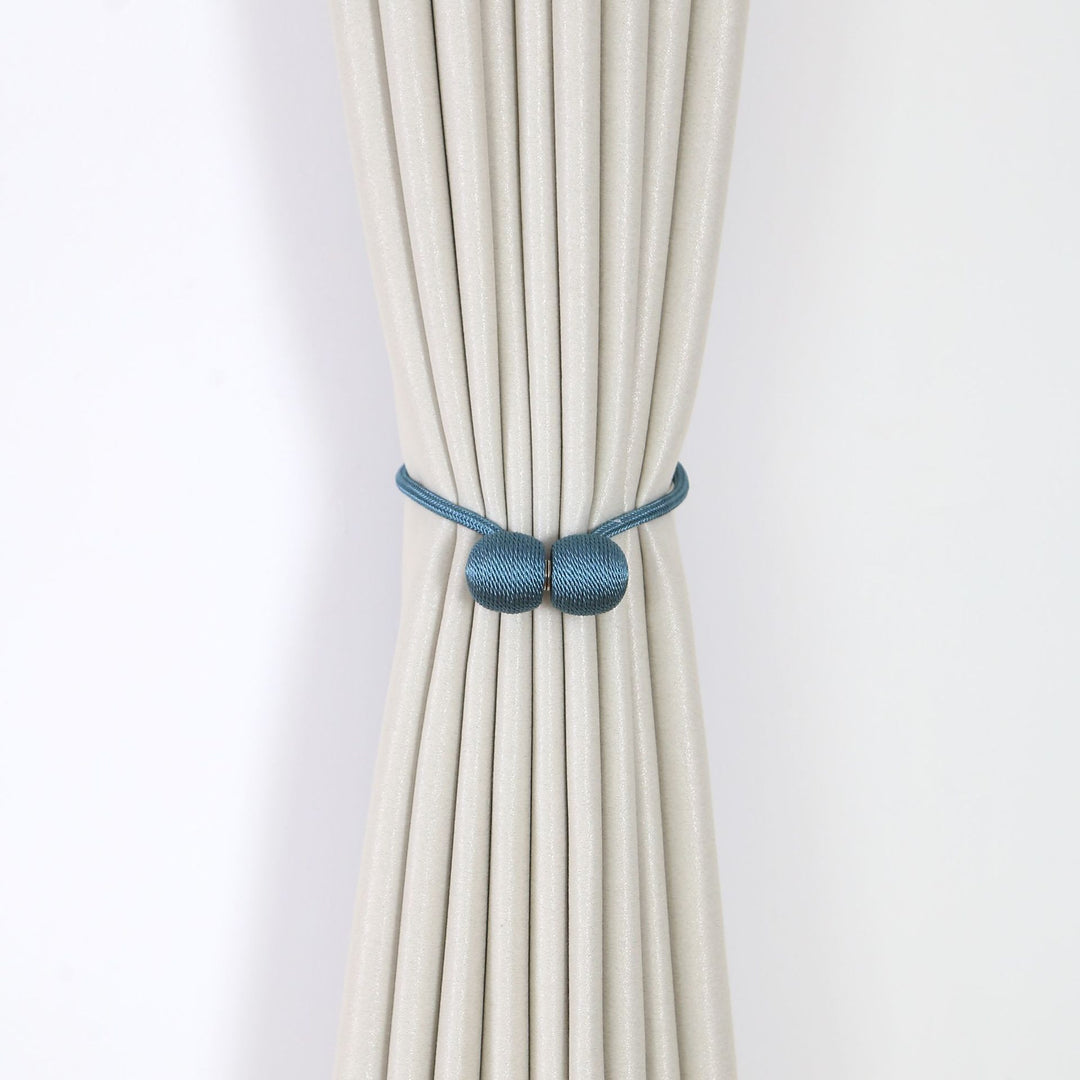 Decorative curtain tieback