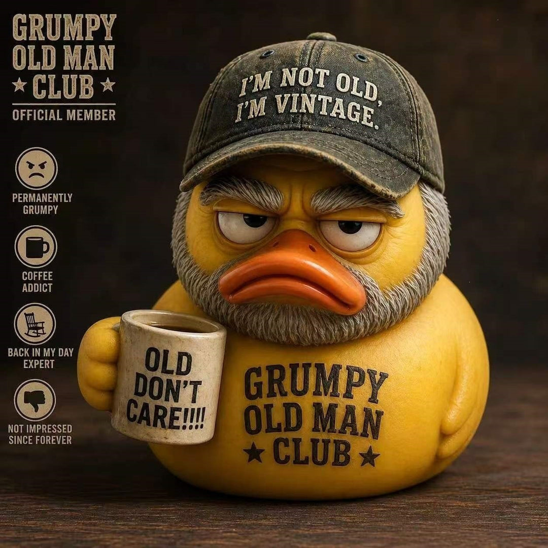 Funny rubber duck with vintage hat and cup