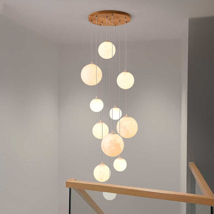 Cascading glass globe pendant lamp with wooden ceiling