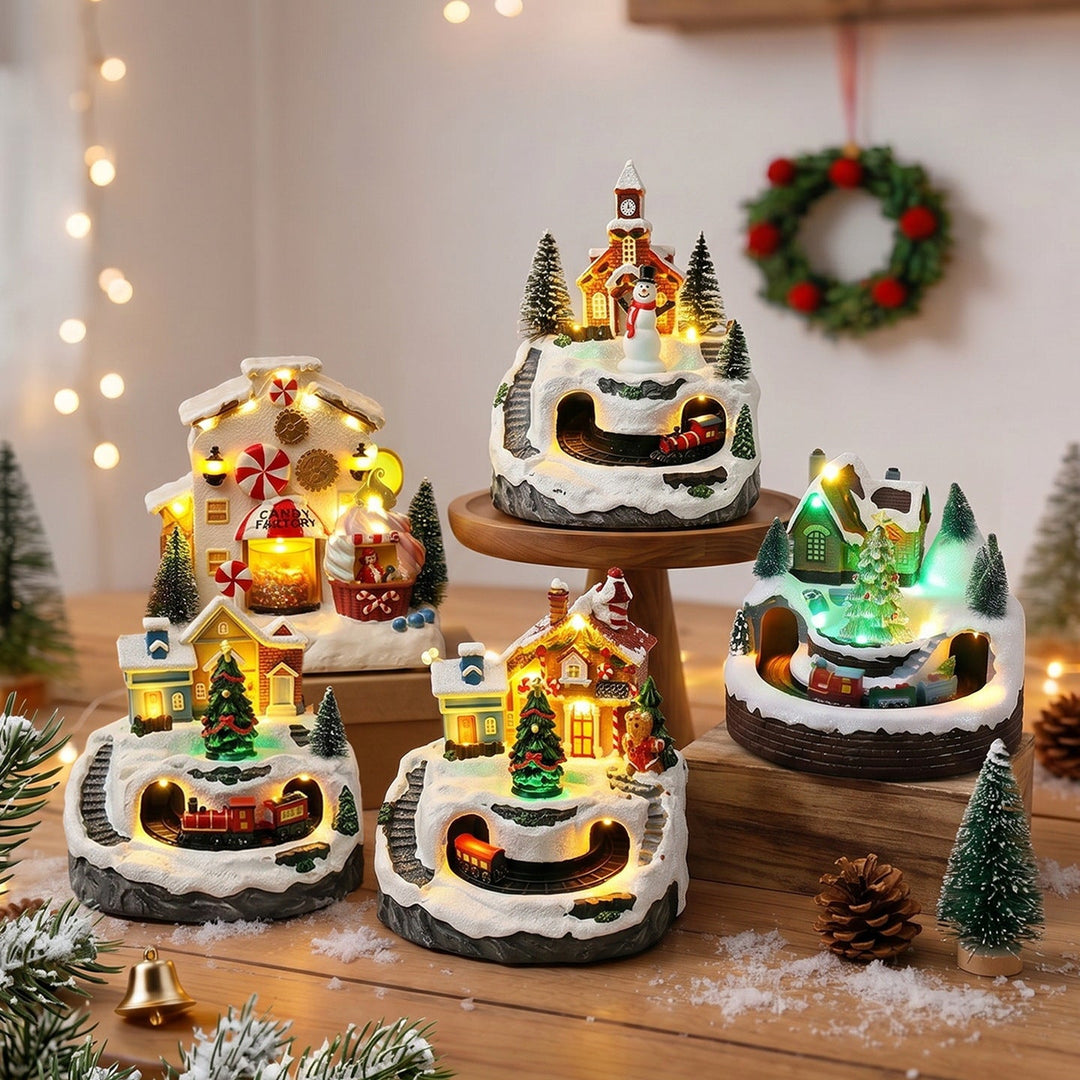 Illuminated Christmas village decoration with moving figures