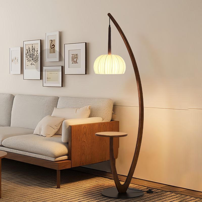 Artistic curved floor lamp with integrated side table
