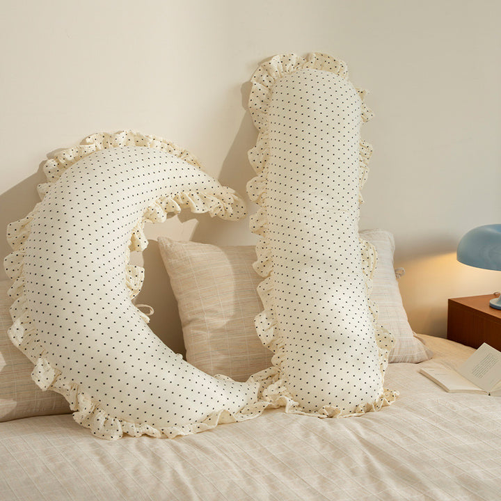Long ruffled hem bolster lumbar cushion with fine dot pattern