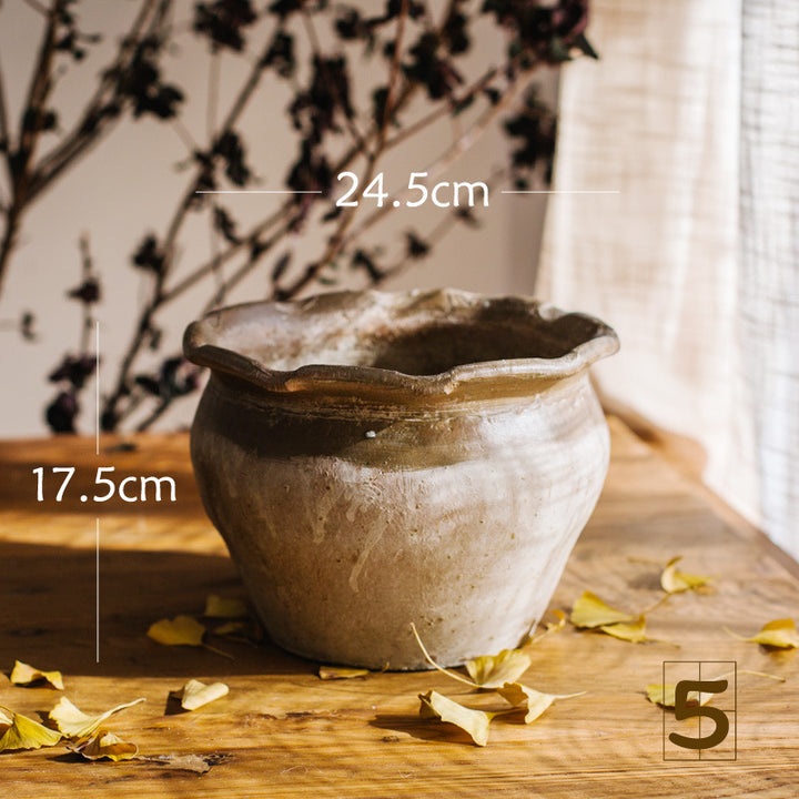 Rustic ceramic pot with handmade design