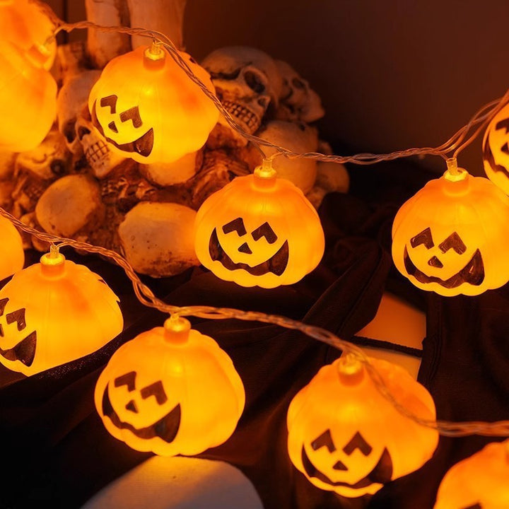 Amber Glass Skull Micro-LED String Lights on Clear Copper Wire