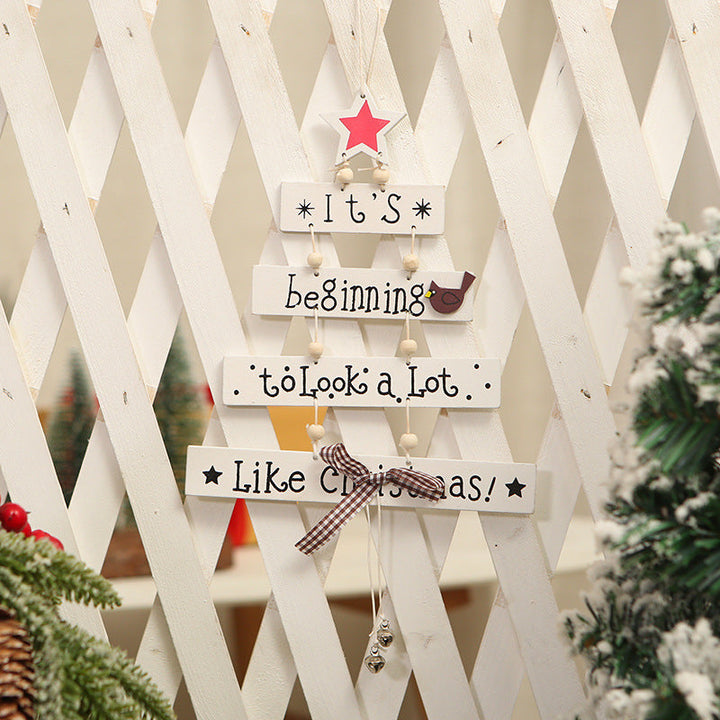 Decorative wooden sign with Christmas greeting