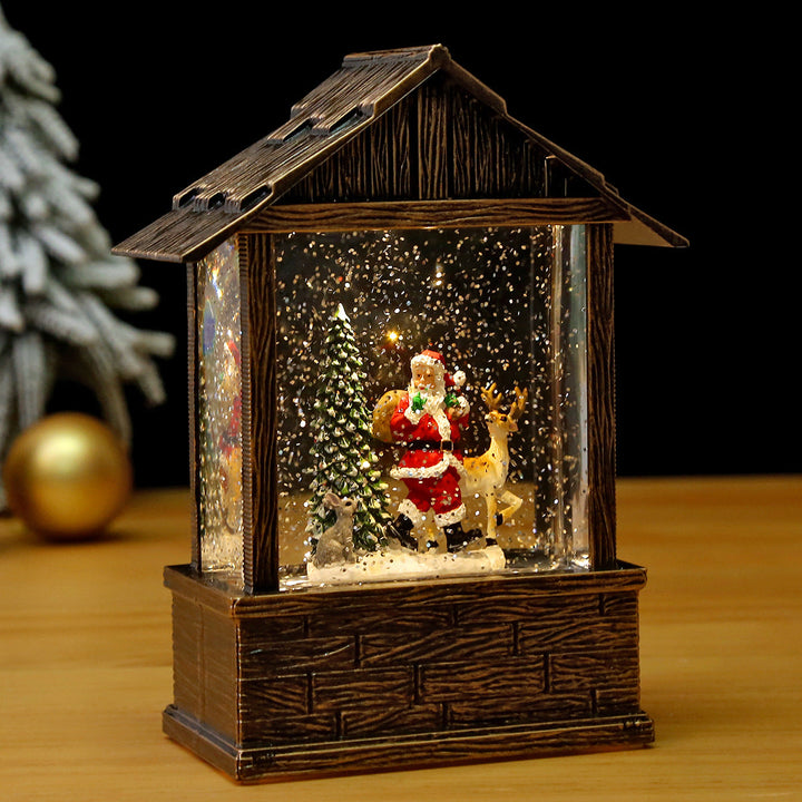 Nostalgic snow globe decoration with Santa Claus and children