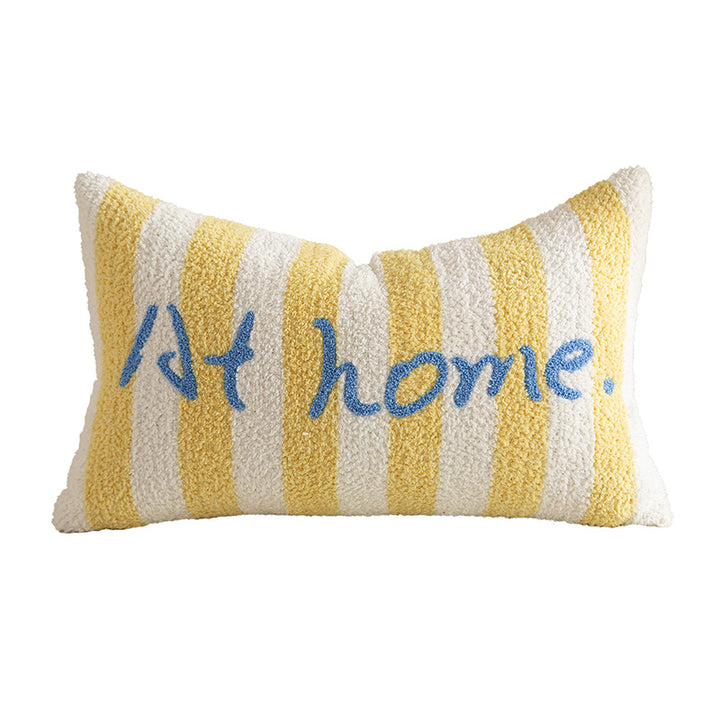 Striped bouclé decorative pillow with embroidered lettering and cuddly filling