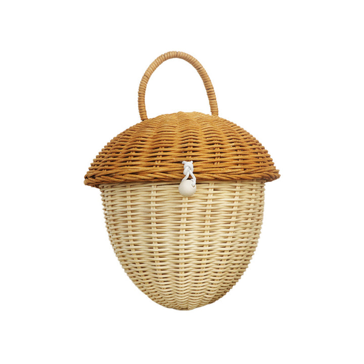 Playful storage basket in acorn design