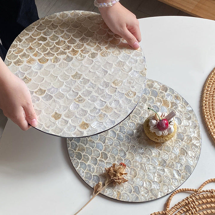 Round serving board made from noble shells