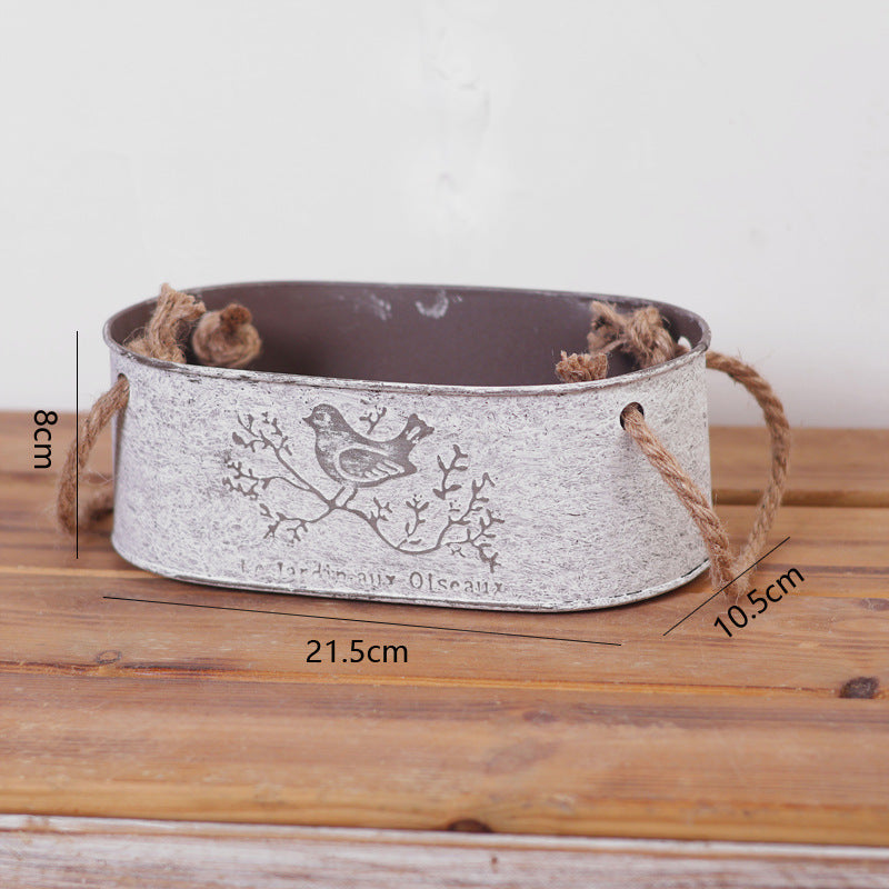 Decorative storage basket made of metal with natural design